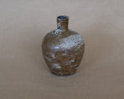 Earthquake bud vase