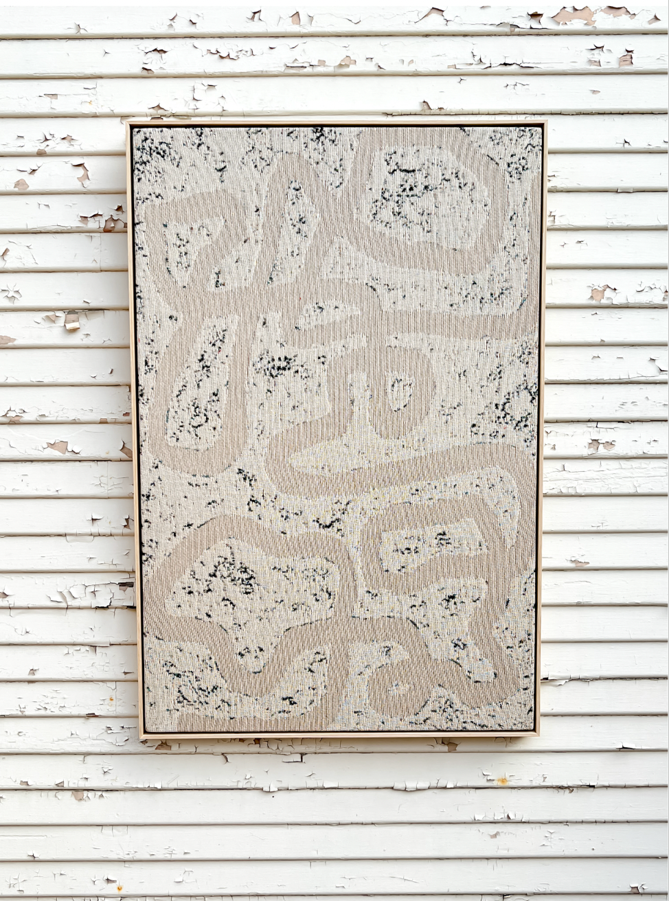 Metamorphic framed woven